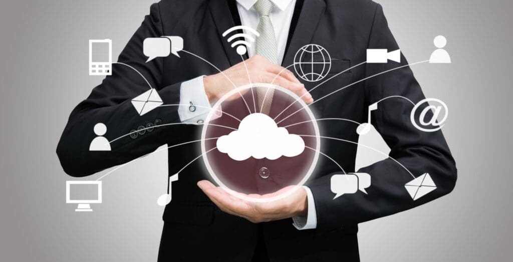 Businessman holding cloud computing network demonstrating cybersecurity vulnerability management aka continuous threat exposure management (CTEM)